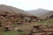 Oukaimeden, shepherds\\\' huts among mountains and green plains in autumn, Morocco
