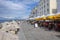 Our Lady of Health Church, Piran / SLOVENIA - June 24, 2018: Peninsula Piran coastline with church and people enjoying sunny day