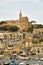 The Our Lady of Lourdes church on the hillside, Gozo island, port Mgarr, Malta