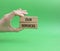 Our services symbol. Concept words Our services on wooden blocks. Businessman hand. Beautiful green background. Business and Our