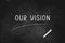 OUR VISION written with chalk on blackboard icon logo design vector illustration
