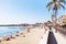 Ourists on beach and waterfront in Giardini Naxos