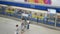 out of focus blur top down view to passengers traveller walking on subway platform station after get off the train commuter in