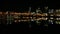 Out of Focus Bokeh of Portland Oregon Downtown City Skyline and Hawthorne Bridge with Water Reflection at Night 1080p