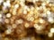 Out of Focus, Defocused, Blurred, Abstract and Bokeh of Sparkling Gold Lights, Suitable for Background Use