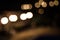 Out of Focus Effect on Photography. Bokeh Blurred Image of Circle of Lights Overlapping. Outdoor Citylife at Nightime