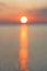 Out of focus sunset over the sea horizon