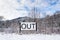 Out sign in snowy landscape, New Years Resolutions, self-improvement concept, lifestyle change, mind-body improvement