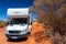 Outback, Australia - November 12, 2022: Motorhome camper van on road trip. People on travel vacation adventure. Tourists in rental