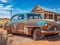 Outback Mystery: Discarded Car atop Abandoned Houses in South Australia.