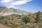 Outback Track at Flinders Range with mountains at the background - South Australia