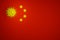 Outbreak of new Coronavirus SARS-CoV-2 in China - viruses of the Corona family on a red base imitating the chinese flag