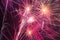 Outbreaks of fireworks in the night sky