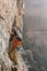 Outdoor activity. Extreme rock climbing lifestyle. Male rock climber on a cliff wall. Siurana, Spain.