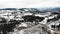 Outdoor aerial view panoramic shot of peaceful winter scenery in mountains.