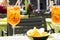 Outdoor aperitif with chips and spritz