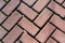 Outdoor brick pavers laid in herringbone pattern