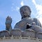 Outdoor bronze statue of seated Tian Tan Buddha in Hong Kong