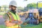 Outdoor builder portrait, construction worker near workplace