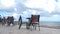 Outdoor cafe with tables and chairs at the beach, perfect summer vacation