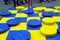Outdoor checkers game figures yellow blue people