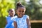 Outdoor close up portrait of a cute young black girl - African p