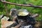 Outdoor cooking soup on the campfire. Camp cooking soup in the cauldron on the open fire.