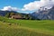 Outdoor countryside house, farm, snow mountain, cow in Switzerland village