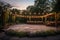 outdoor dance floor surrounded by greenery and delicate lights at dusk