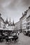 Outdoor dinning at Market place des Halles in Medieval town Neuchatel, Switzerland