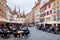 Outdoor dinning at Market place des Halles in Medieval town Neuchatel, Switzerland