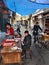 Outdoor eatery in narrow street of Shanghai, Chinese fastfood.