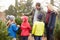 Outdoor Family Choosing Christmas Tree Together