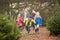 Outdoor Family Choosing Christmas Tree Together