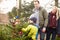 Outdoor Family Choosing Christmas Tree Together