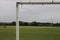 Outdoor field football area with several white goal posts