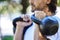 Outdoor, fitness and man with kettlebell in park for exercise, training and workout in nature. Sports, male person and