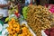 Outdoor fruit market with many different Asian organic fresh fruits.