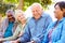 Outdoor Group Portrait Of Senior Friends