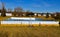 An outdoor ice hockey arena in a housing development