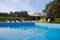 Outdoor inground residential swimming pool in backyard