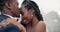 Outdoor, kiss and black couple with love, wedding and hug with marriage, happiness and celebration. African man, happy