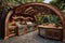 Outdoor Kitchen With Grill and Sink, Functional , Front view of an outdoor BBQ area with an arched gazebo, stainless steel BBQ,