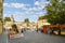 Outdoor market square with stairs connecting Kampa Island to the Charles Bridge in Prague, Czech Republic