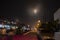 outdoor night scene of asian people celebrating chinese new year on the street.