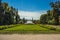 Outdoor park with trees and fontain in summer bright colorful