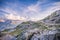 Outdoor Photographer Standing on the Edge of Mountain in front of Iconic Mont-Blanc