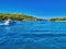 Outdoor photography of a tropical bay. You will find beautiful white beaches and azure crystal clear waters all around it. Scenic