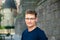 Outdoor portrait of a 44 yo white man with eyeglasses, Brussels, Belgium