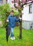 Outdoor portrait of adorable boy with umbrella